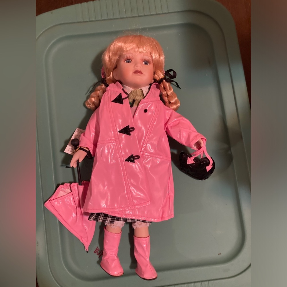 Doll with purse and umbrella